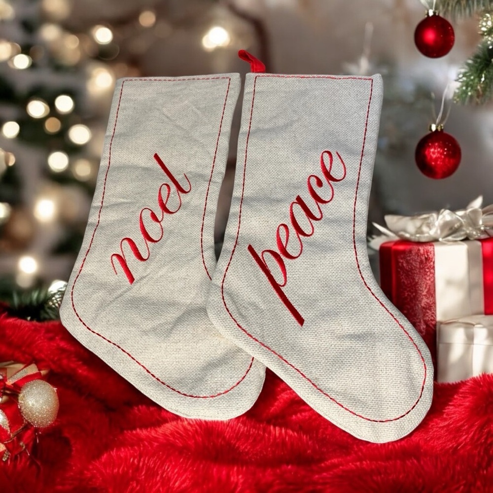 Peace and Noelβ Christmas burlap stockings. Set of two.